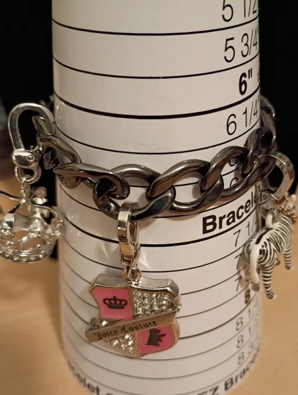 Juicy Couture Gunmetal charm bracelet With 4 Charms!